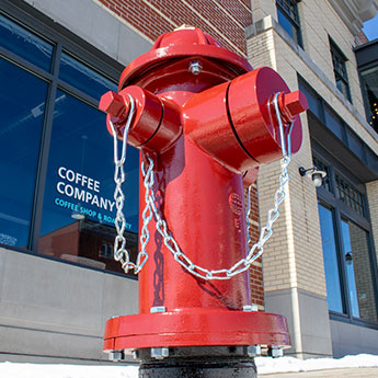 EJ WaterMaster fire hydrant in front of coffee shop East Jordan, Michigan