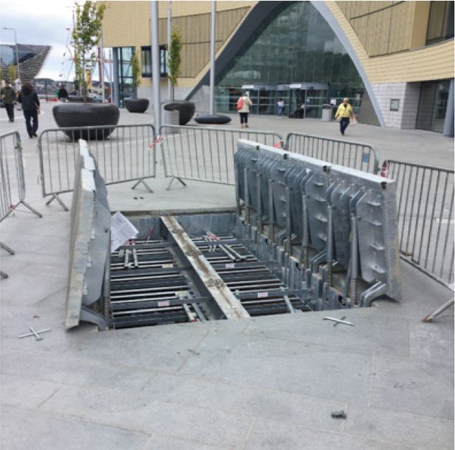 Urban redevelopment - steel recessed covers for paving infill with lift ass...